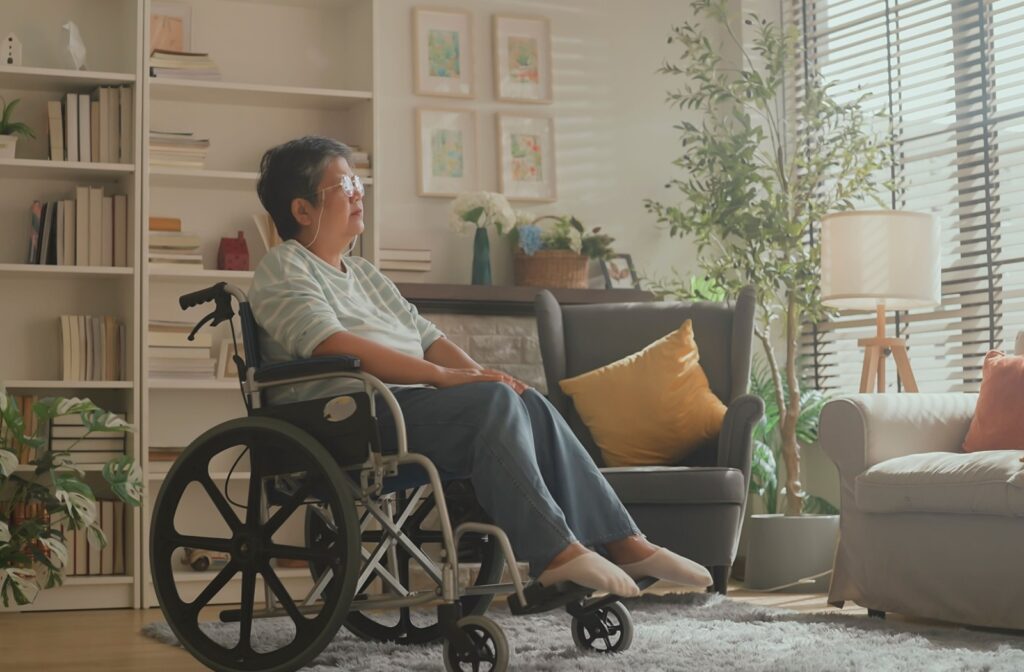 A senior in a wheelchair stares sadly out of the window in their living room, internally struggling to meet their own needs Xen Virtue Xen Virtue 11:57 AM May 11 https://www.shutterstock.com/create/editor/CiQyYTg0MjdmZC0zMzhkLTQ2ZWUtOWEwNS1iZDc0MmUyMjc3ODI Xen Virtue Xen Virtue 11:58 AM May 11 Alt Text: A nurse smiles in between a smiling older couple, happy to have moved into assisted living